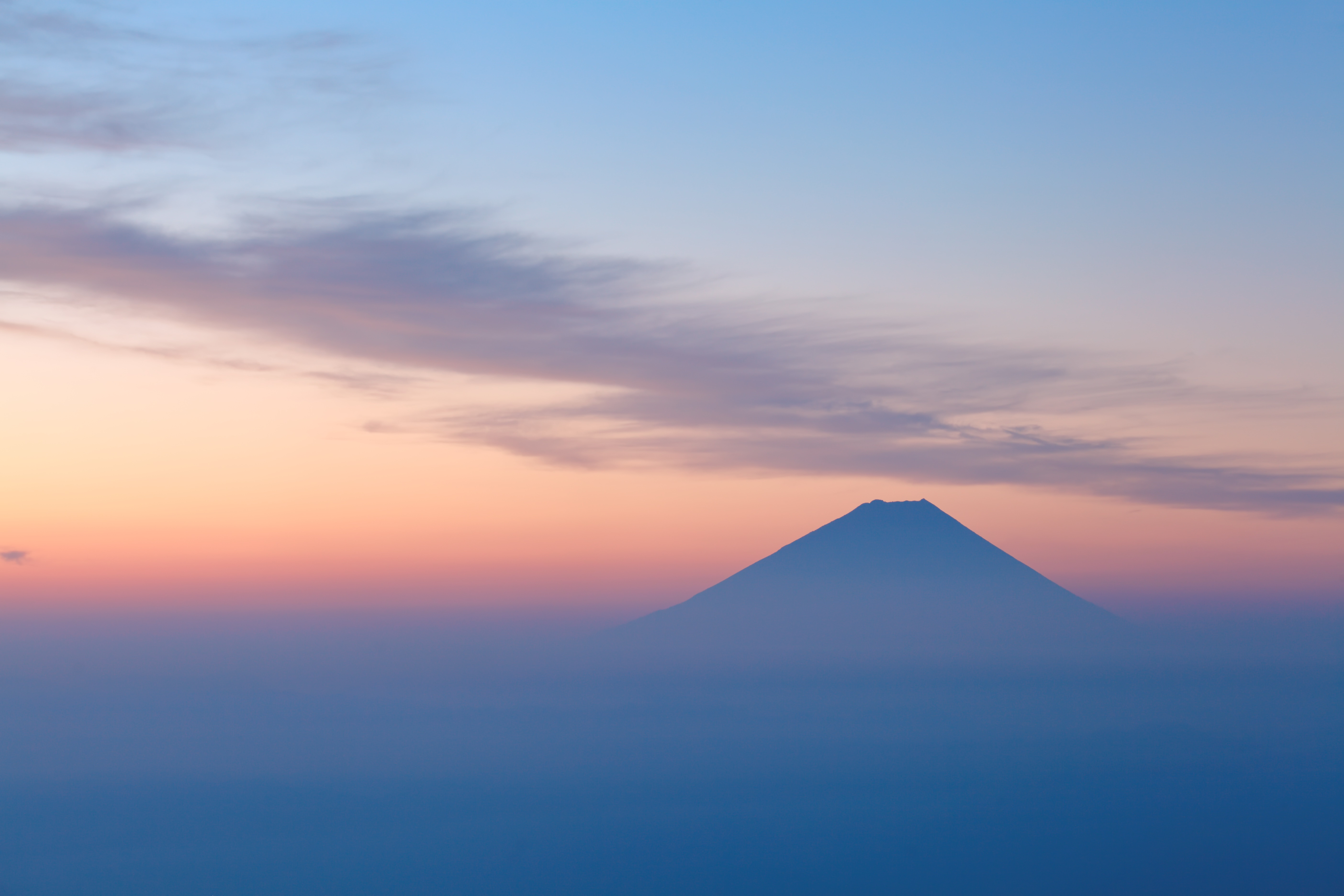 Top of Mountain Fuji and sunrise sky